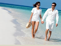 Couple on the Beach in the Caribbean - Discovery Cruises 2 Day Cruise to the Bahamas Couple on the Beach in the Bahamas